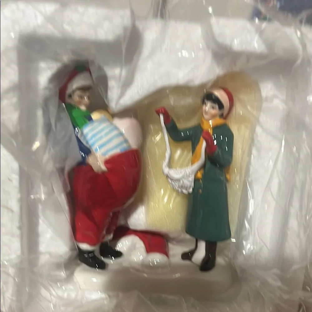 Department 56 Snow Village Christmas Lane Figurine. Dads Christmas tradition